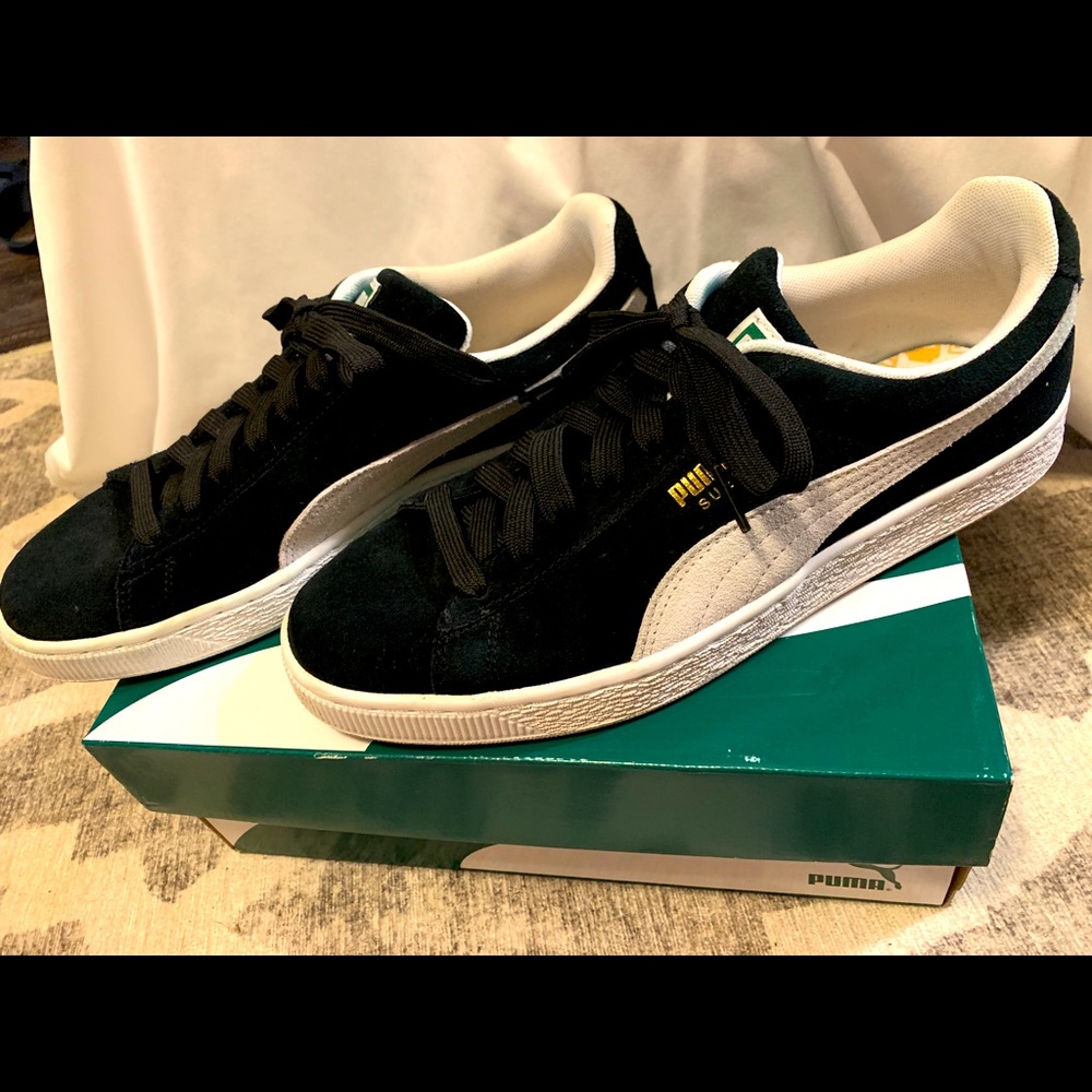Mens size 9 Pumas felt!!
